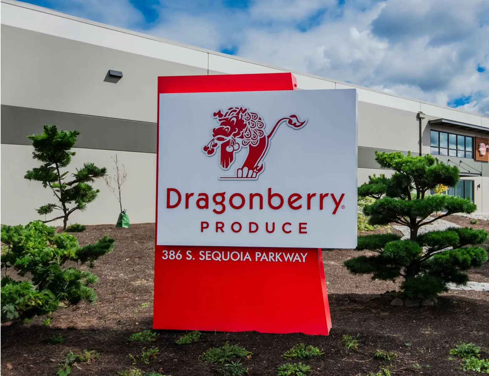 Sign displays Dragonberry Produce, 386 S. Sequoia Parkway, outside a building.